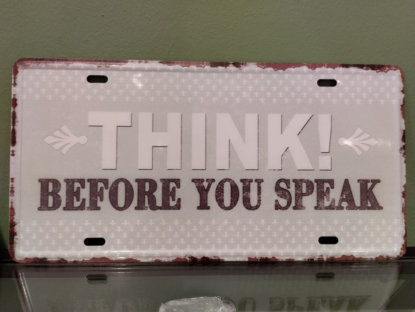Plåtskylt Think before you speak - Ord. Pris 129