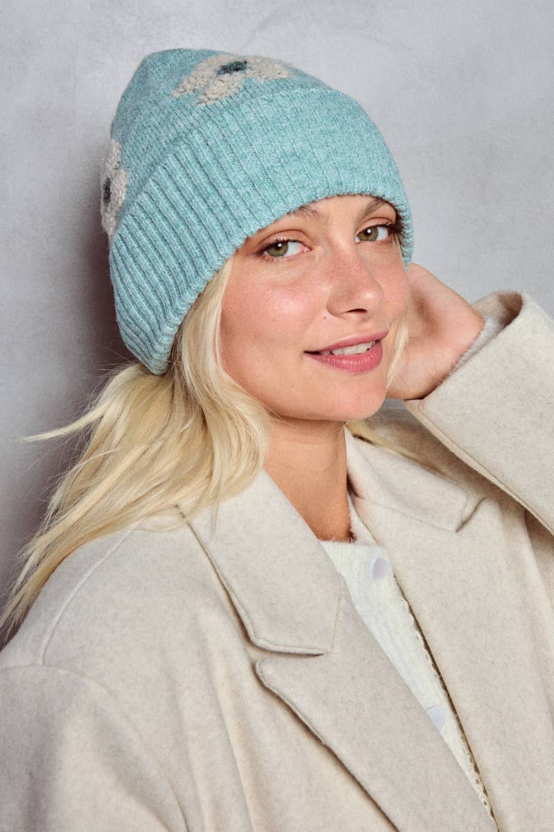 Blommig mössa i ull: Ljusblå - 20% Ull