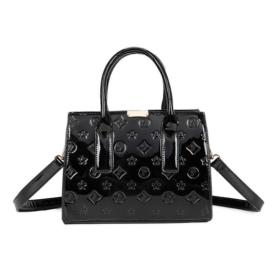 Stella handväska med gulddetaljer: Svart