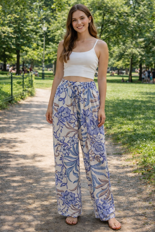 Blå blommiga byxor med fickor - M/L - 952-7